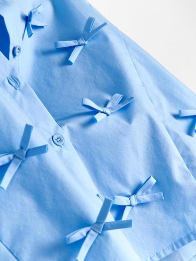 Reserved bow detail shirt size fits Xs s small m