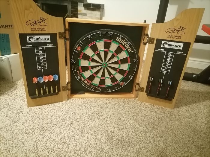 Dartboard with darts