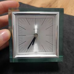 This is an Acctim Hamilton mantel clock made of glass and metal.