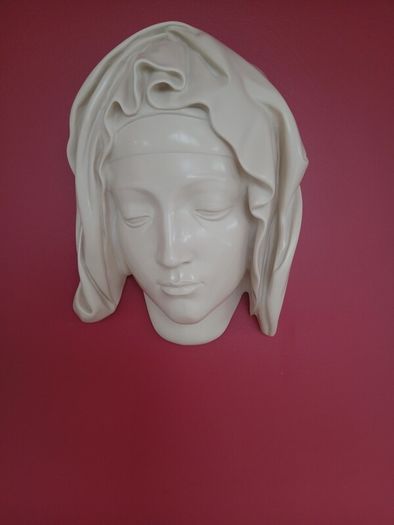 Antique wall religious sculpture