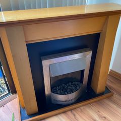 Fireplace with simplex electric fire