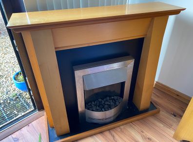 Fireplace with simplex electric fire