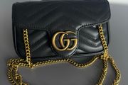 Black leather quilted mini bag