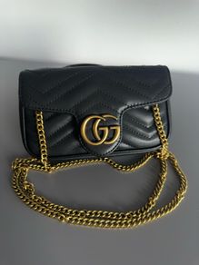 Black leather quilted mini bag
