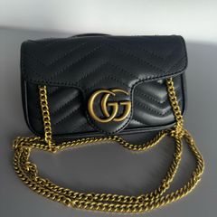 Black leather quilted mini bag