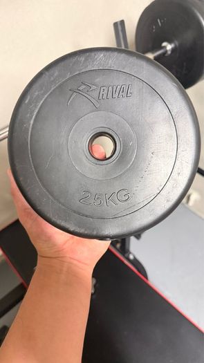 Gym bench, bar and weights.