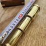 minature nauticle brass telescope in brass inlay box. Image 2
