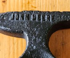 John Deere Vintage Minature Blacksmith's Combined Farm Tractor Collector Paperweight.  See Photos.
