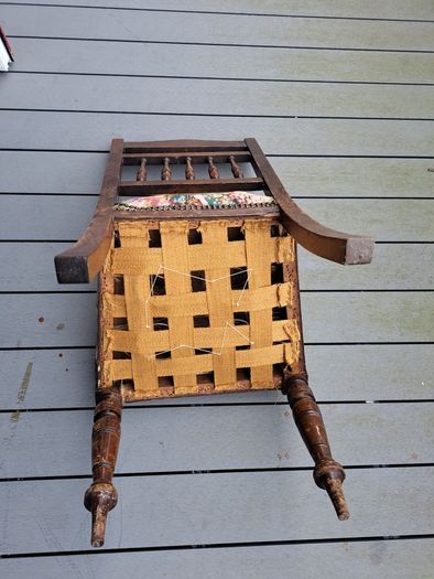 Vintage wooden chair with floral upholstery