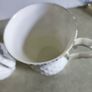 Set of 2 mugs decorative porcelain  fine bone china featuring a distinct textured, quilted or honeycomb base and intricate floral patterns. Image 7