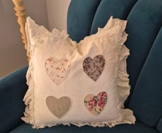 Heart feather cushion