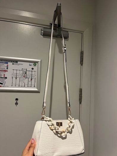 white leather hand bag
