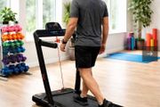 Treadmill converts to walking pad