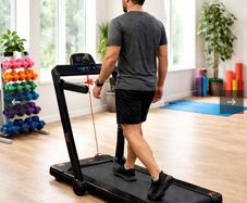 Treadmill converts to walking pad