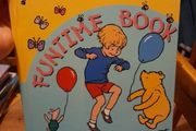 Winnie the Pooh hardback book with stories and puzzles