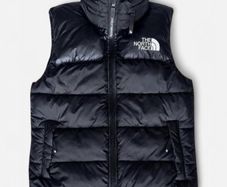The North Face black puffer gilet in size XS