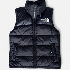 The North Face black puffer gilet in size XS