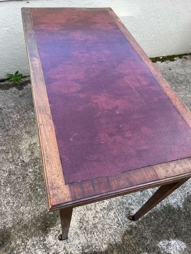 Maghoney wine leather desk with 2 drawers. Inlaid