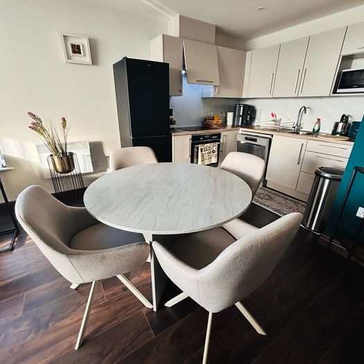 Dining table and 4 chairs .