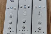 A set of 3 Nintendo Wii controllers
