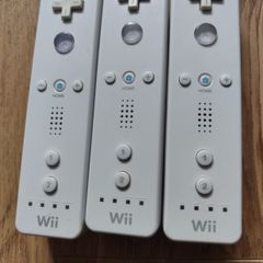 A set of 3 Nintendo Wii controllers
