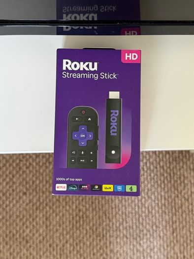 TV with Roku and Console Table