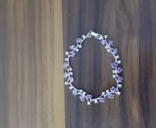Stg silver bracelet with amethyst and clear stones