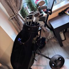 golf caddy and clubs