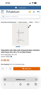 Adjustable chrome and glass side table