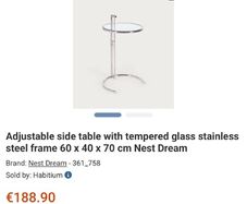 Adjustable chrome and glass side table
