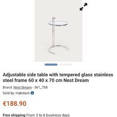 Adjustable chrome and glass side table