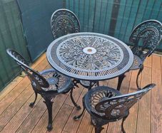Garden table and 4 Chairs (ornate cast aluminium)