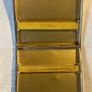 cigarette or card caseThis is a mid-century modern silver-plated cigarette case featuring an abstract, geometric grid and line pattern. Image 3