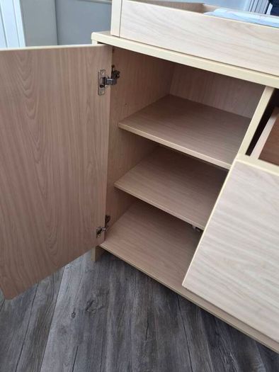 Kub Madera baby changing table and storage.