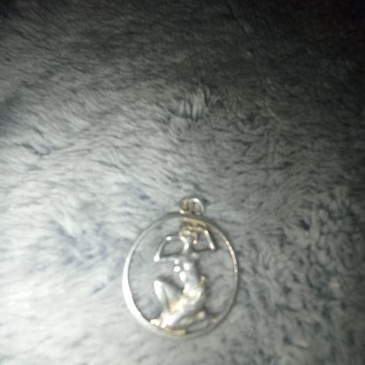 Vintage silver lady pendant