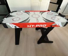 Fold away air hockey table