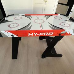 Fold away air hockey table