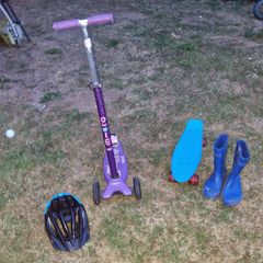 Scooter, bike helmet, skateboard, wellies