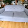 DFS grey fabric sofa - button back detail Image 6
