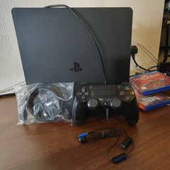 PS4 Slim (500GB) with Red Dead Redemption 2 and Spider-Man