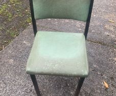Old dirty chairs and marquis poles