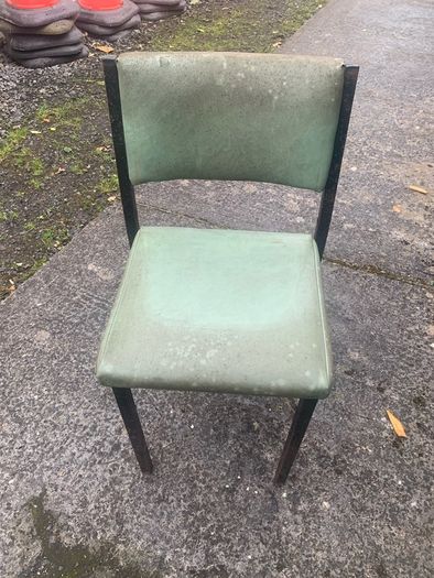 Old dirty chairs and marquis poles