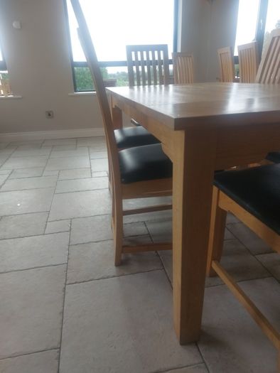 solid oak dining table and chairs