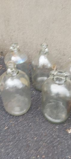 13 x demi johns,glass jars ,used condition, needs a clean,,buyer collects,,10 euros each or a deal  for the 13 ,sold as is