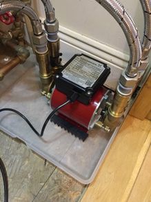 Grundfos shower pump.