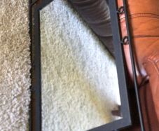 Black iron framed mirror