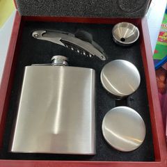 Drinks flask cups and cork screw