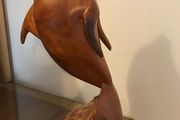 Vintage hand-carved wooden leaping dolphin