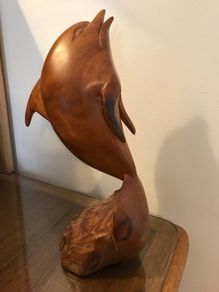 Vintage hand-carved wooden leaping dolphin