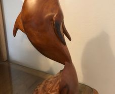 Vintage hand-carved wooden leaping dolphin
